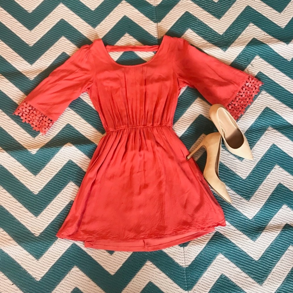 Coral dress with floral sleeves